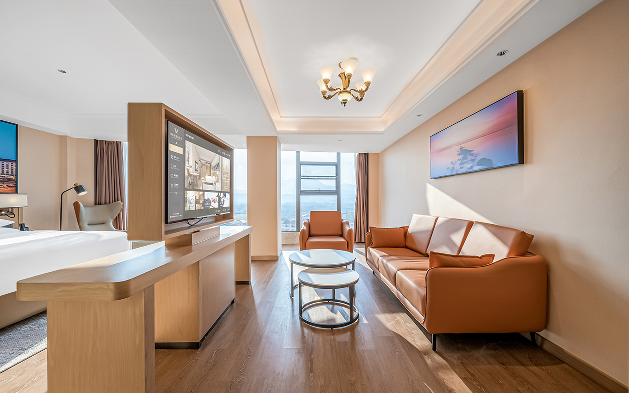 Vienna International Hotel (Nanfeng Judu Avenue) over view kingsize bed room