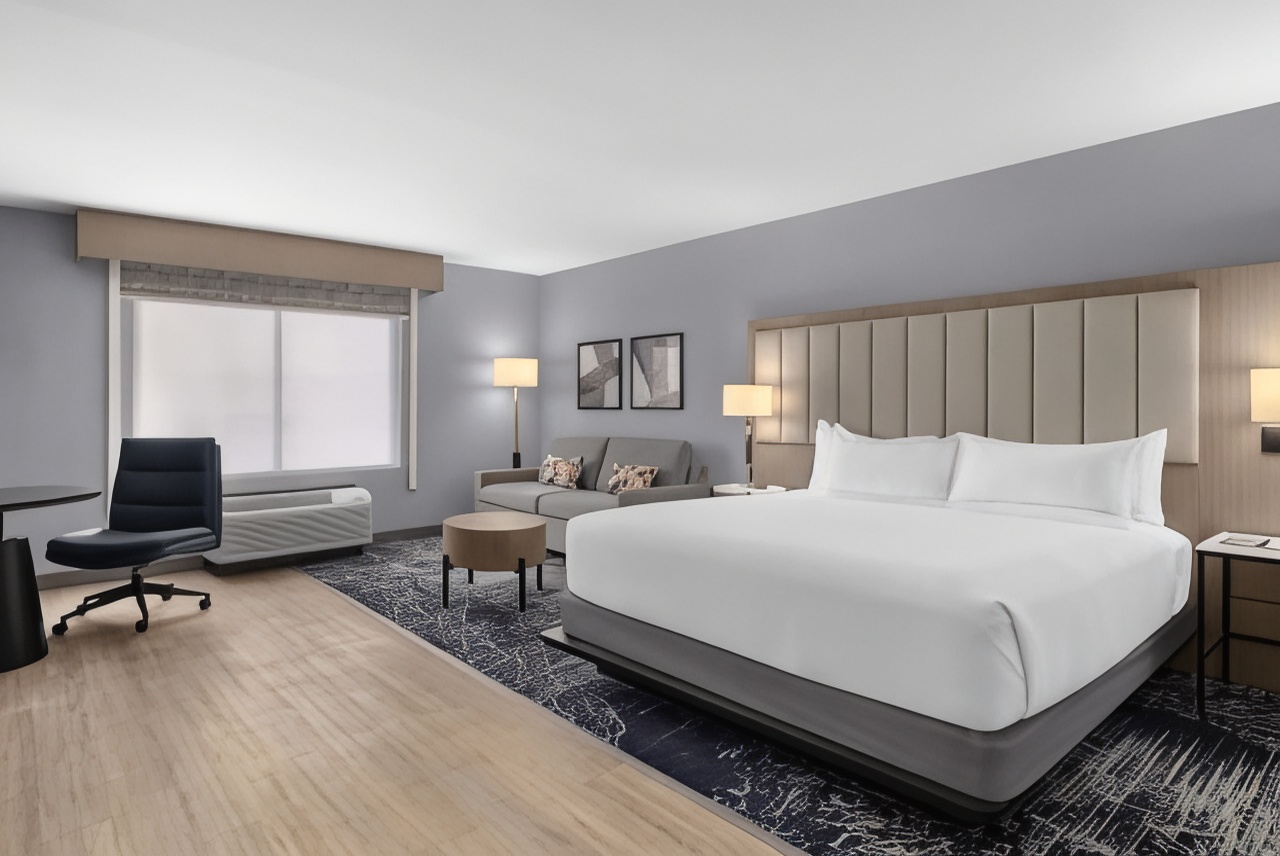 豪华无烟带1张特大床和梳化床的转角客房