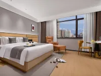 Junyang Hotel (Aksu Railway Station Old Street Night Market) Hotele w: Aksu