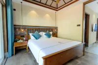 Jishu Holiday Apartment (Menghai Mengbala Store)