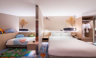 The hotel offers a bedroom with double beds and an attached bathroom in the main living area specifically designed for children at Sunworld Hotel