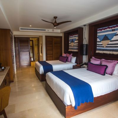 Junior Two Queen Suite with Partial Ocean View Secrets Cap Cana Resort & Spa Promo Code