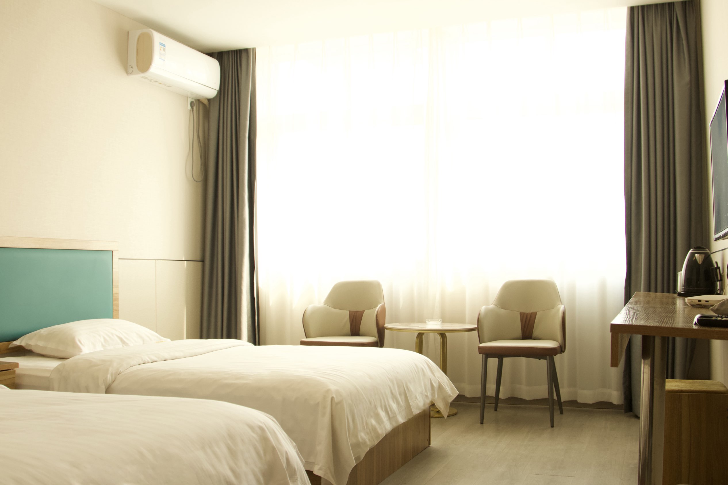 Xinyang New Century Business Hotel豪華標準間