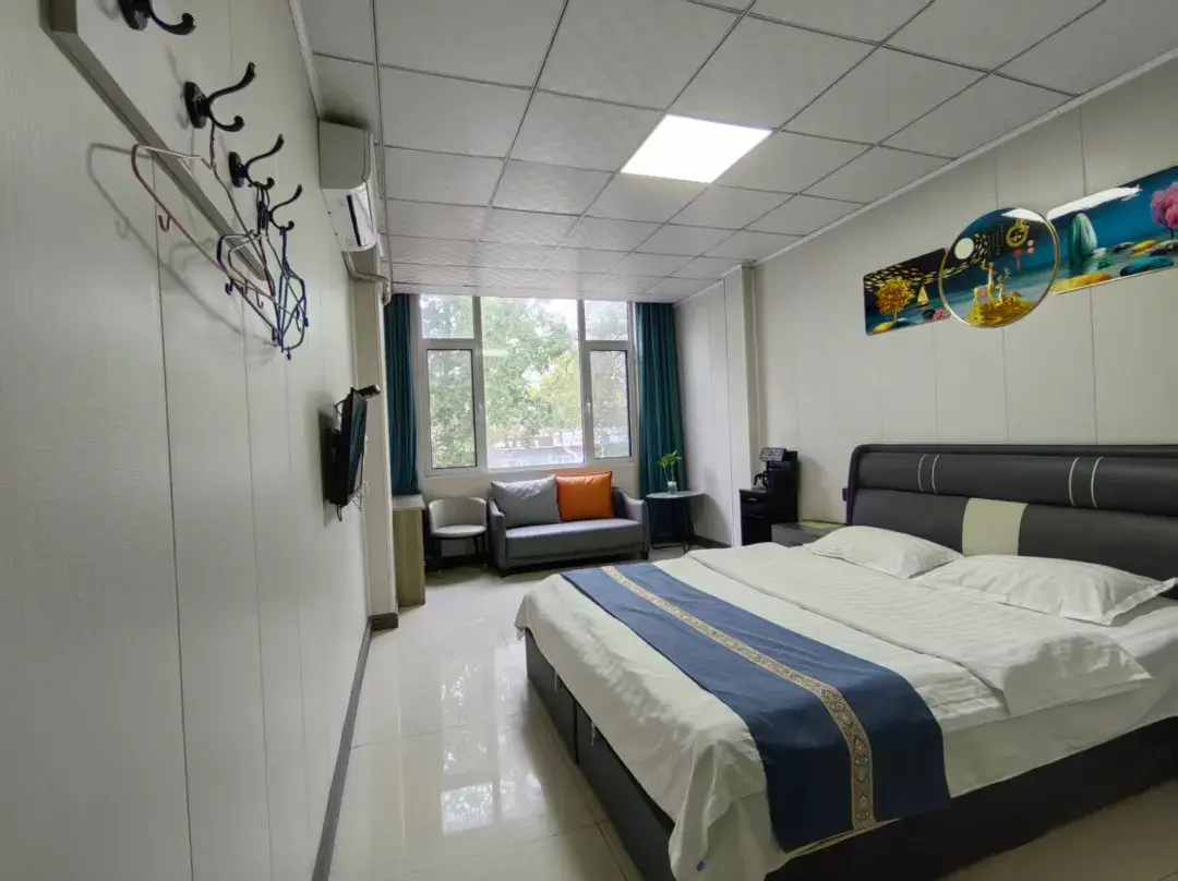 Xinyu Business Hotel - Linyi