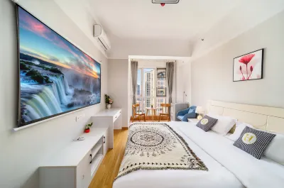Journey Station Boutique Hotel Apartment (Wuhan Railway Station Happy Valley) Отели в г. 