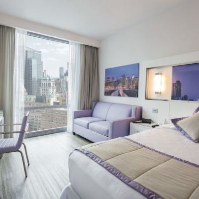 Deluxe Family King Room with Sofa Bed Hotel Riu Plaza New York Times Square Promo Code