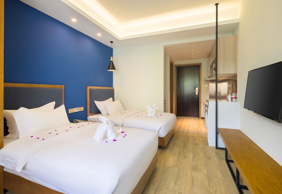 Nanxing holiday hotel (Mount Emei tourist center, Emeishan high-speed railway station) Elegant Room (2 beds)