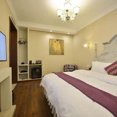 陽光雅悅大床房（庭院景色+LEOXAO洗護套裝+獨立冰箱） 蘇荷精選花園別墅飯店（上海交通大學地鐵站武康大樓旗艦店）優惠