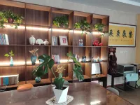 Xingping Aishang Qingshe Hotel