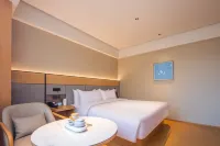 Ximan Hotel (Shanzhou District Government Wucaicheng Shopping Center)