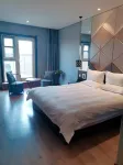 Elong Migao Fashion Hotel (Fei County New Bus Station)