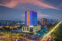 Minghua Hotel (Aksu Tianbai Fashion Shopping Center Xinglong Underground Street Branch) Hoteles en 