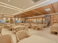Mingsheng Grand Hotel (tuscaloosa area WuSu railway station nine lotus springs park inn) Ξενοδοχεία στην πόλη Γουούσο