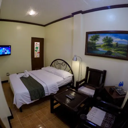 The Executive Villa Inn & Suites