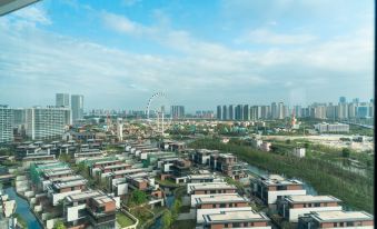 Ferris Wheel Panorama Apartment (Overseas Chinese City Happy Coast Branch)
