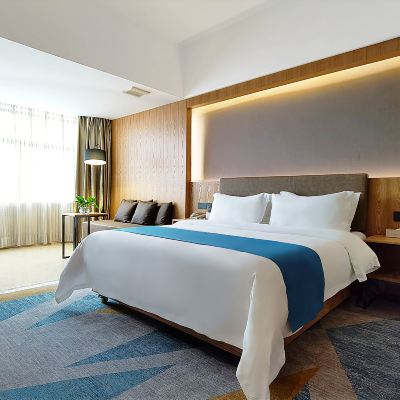 逸眠大床房（靜音床墊+璀璨街景+商務專用辦公桌） Amigo米閣酒店（東莞火車站店）優惠