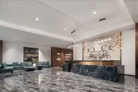 Meihao EZZI Hotel (Zhongshan Xiaolan Daxin Xinduhui) Отели в г. 