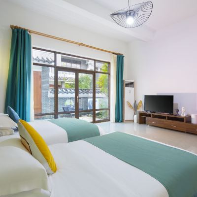 若畔庭院雙床房 蕉葉民宿（三亞免税城店）優惠