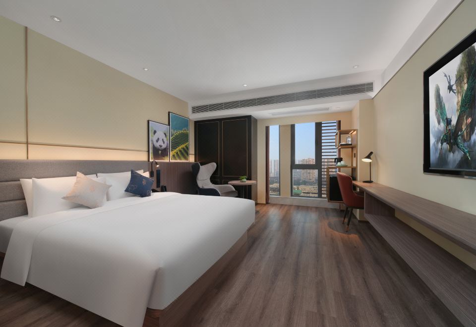 高級大床房（65寸可投屏+小冰箱＋加熱毛巾桿）