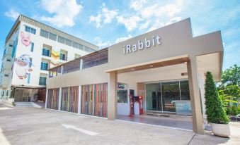 "a large building with a colorful facade and the word "" rabbit "" written in front of it" at IRabbit Hotel