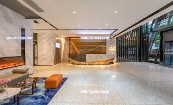 The lobby is situated in a spacious and contemporary room that features an open concept design at Homeinn Selected (Foshan Zumiao Metro Station)