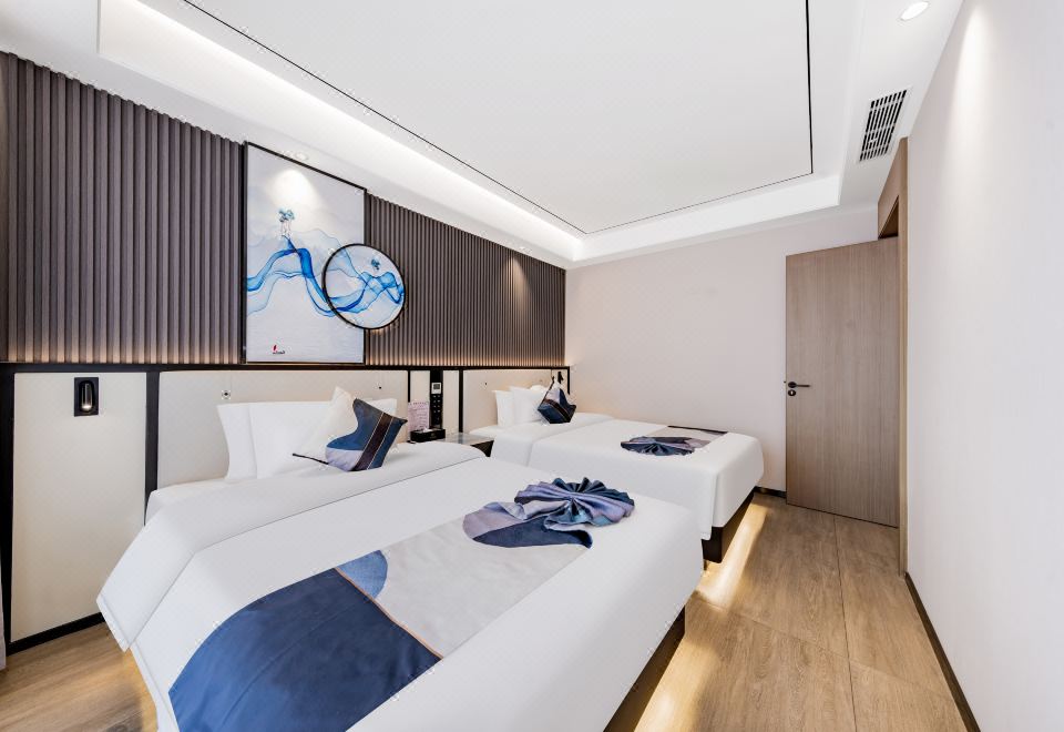 Xizi Light Luxury Hotel (Urad Qianqi Government Store)Deluxe Family Smart Suite (2 Beds)