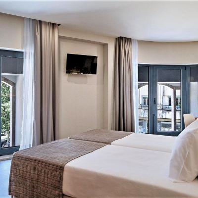 Triple Room With Extra Bed Exe Liberdade Promo Code