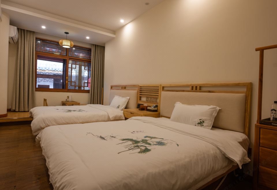 Xinlongmen GuesthouseJapanese-style Tatami Room