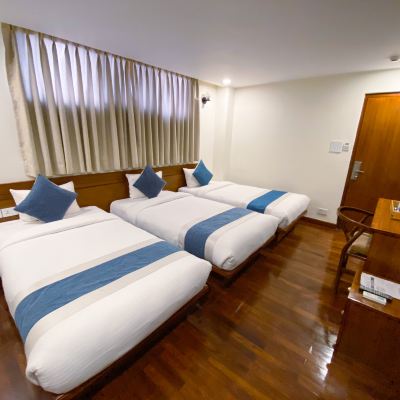 Deluxe Triple Room Timber House Promo Code