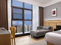 Junyang Hotel (Aksu Railway Station Old Street Night Market) Hotele w: Aksu