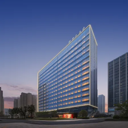 Maison New Century Hotel Huzhou Отели в г. Дэцин