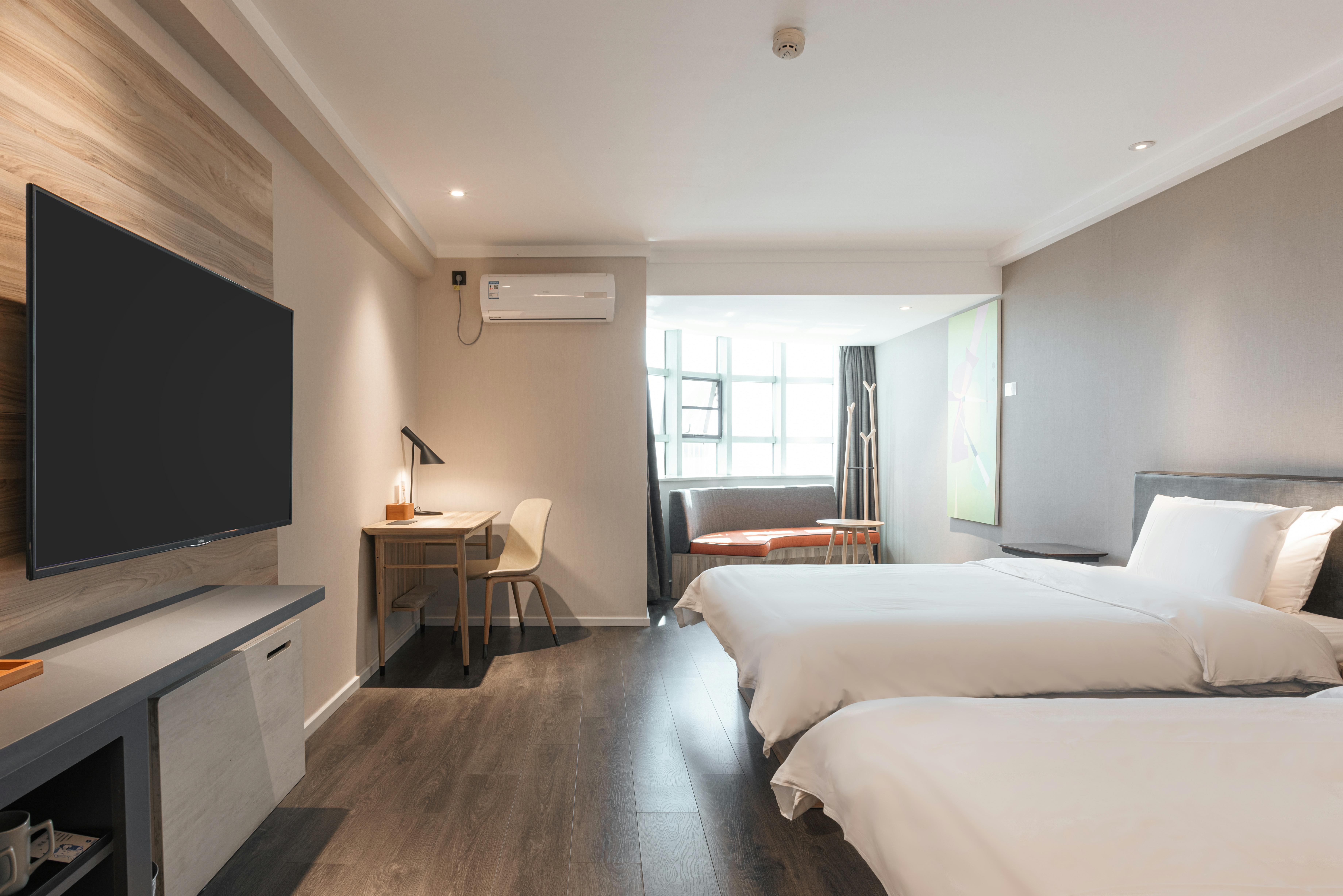 HanTing Premium Hotel (Kunming Donghua)家庭房【金可儿床垫+电视投屏】