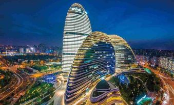 Yuanyu Wangjing Soho Hesheng Qilinshe Apartment Hotel