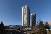 Tuyuan Seaview LOFT Holiday Apartment (Weihai Ferry Terminal Huafa Xintiandi Branch)