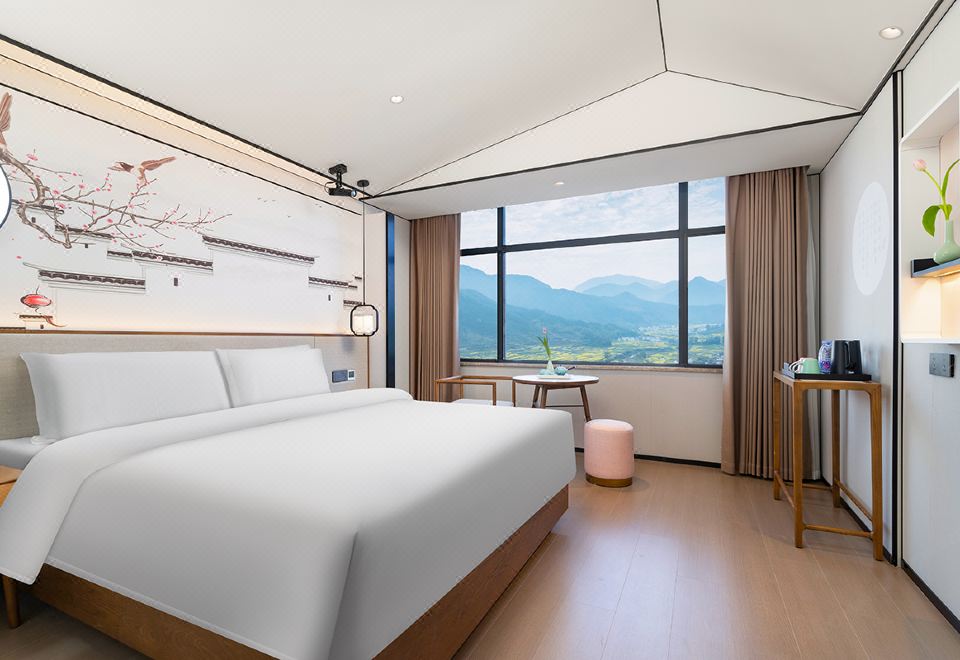 Moshang Qingju Hotel (Wuyuan High-speed Railway Station) Fengyun Smart Double Bed Room (Air Purifier + Landscape Tea Set)