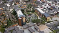 Dingnan County Blossoming in Order Bula Hotel