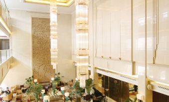 The first photo shows the lobby of Hotel Indigo Shanghai Hongqiao CBD at Okura Garden Hotel Shanghai