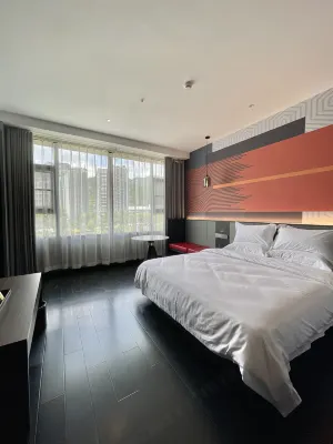 Home Inn UP Huayi Element Boutique Hotel (Wanyuan Railway Station Branch)