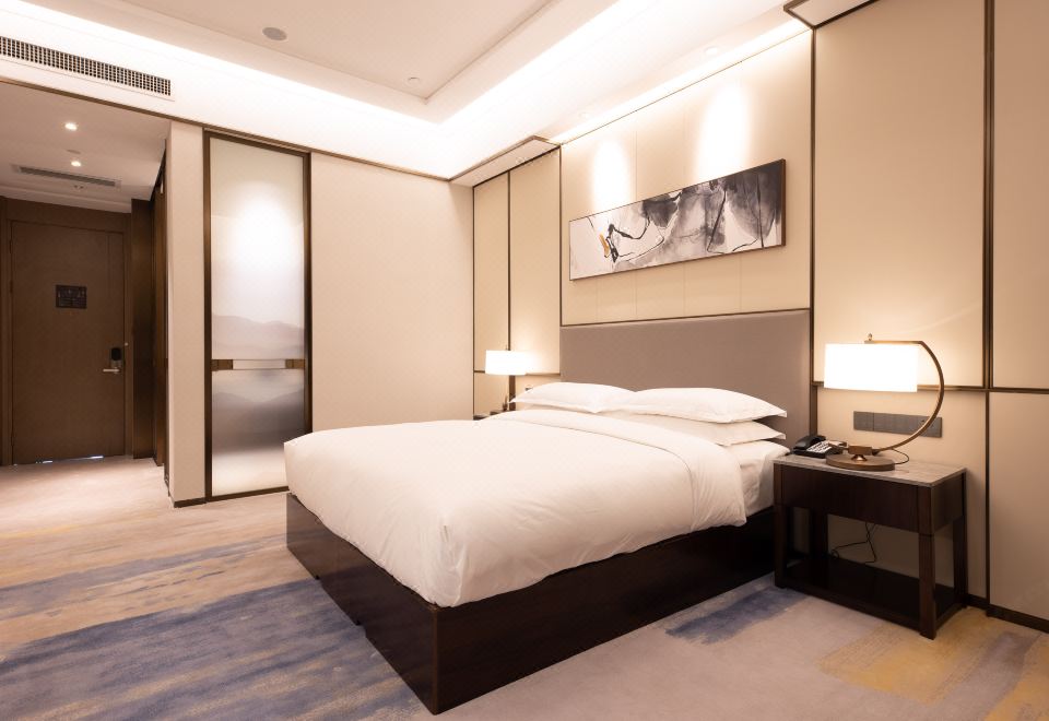 PTOSSOM HOTELBusiness Queen Room