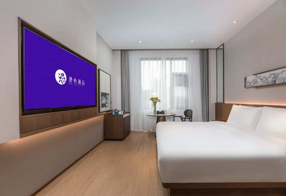 心怡标准大床房（智能客控+金可儿床垫+MiniBAR）