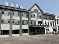 Weiduo Business Hotel Hotel di Anda