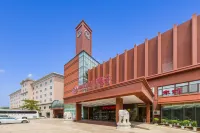 Huazhong Holiday Hotel Hotel di Times Commercial Mansion/Wanbo Square