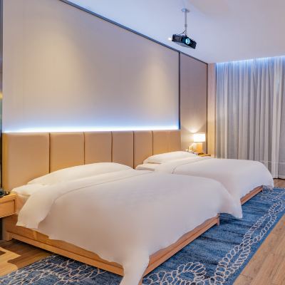 巨幕影院雙床房（100寸超大屏幕） 皇馬假日醉海南大酒店（海口濱海大道秀英店）優惠