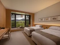 Shenyudao Holiday Hotel فنادق في باوتينغ