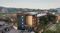 Dingnan County Blossoming in Order Bula Hotel