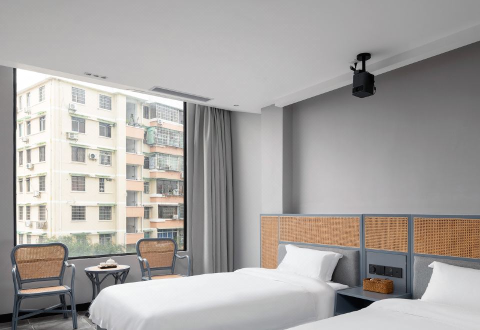 臻选影音双床房（超大玻璃窗+巨幕投影+暖气加持）