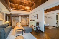 Chuan Shang Yu Nan Cheng Bie Yuan Homestay (Tongren Ancient City Branch) Hotéis em 