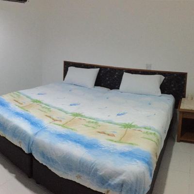 Bilik dengan 2 Katil Single Kupon Pangkor Home Sea Village