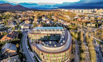 Sercotel Jardines de Uleta Suites - Housity
