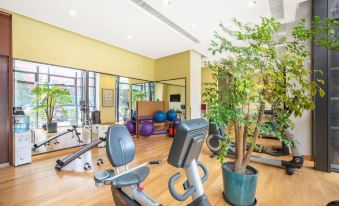 The home offers residents a spacious gym and an outdoor living area for their enjoyment at Holiday Inn Express Beijing Dongzhimen